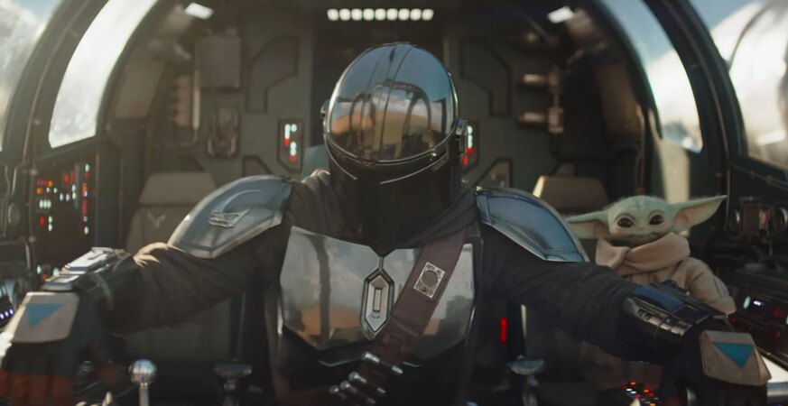 (L-R) Mandalorian (Pedro Pascal) and Grogu in Lucasfilm's The Mandalorian and Grogu