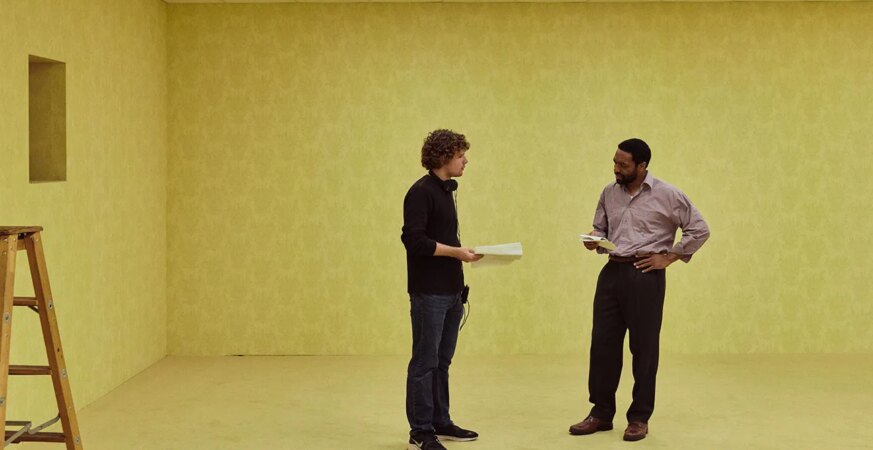 BACKROOMS, from left: director Kane Parsons, Chiwetel Ejiofor, on set, 2026. © A24 / courtesy Everett Collection
