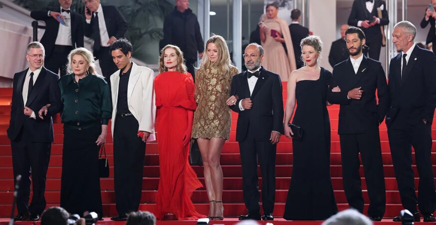 (L-R) Alexandre Mallet-Guy, Catherine Deneuve, Adam Bessa, Isabelle Huppert, Virginie Efira, Asghar Farhadi, India Hair, Pierre Niney and Vincent Cassel attend the Histoires Parallèles (Parallel Tales) screening during the 79th annual Cannes Film Festival at Palais des Festivals on May 14, 2026 in Cannes, France.