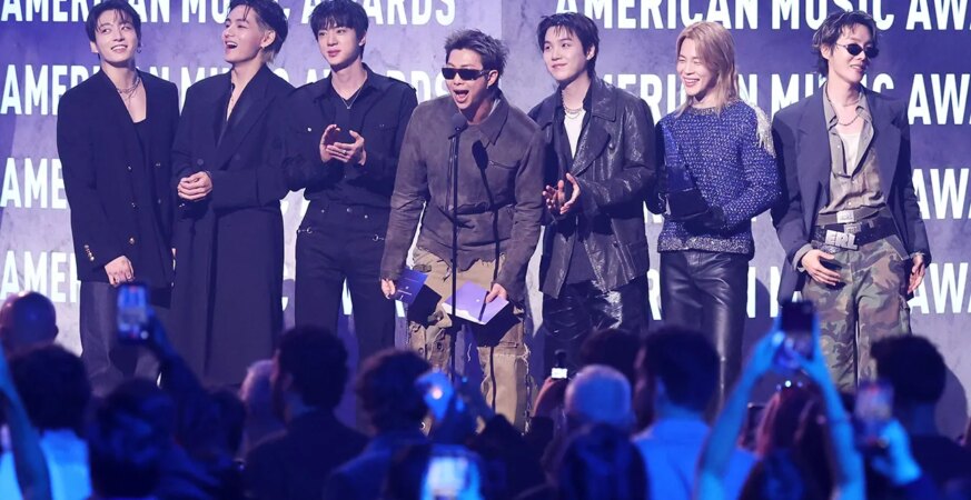 Jung Kook, V, Jin, RM, Suga, Jimin and Jeongjin Park of BTS accept the Artist of the Year award onstage at The 52nd American Music Awards held at the MGM Grand Garden Arena on May 25, 2026 in Las Vegas, Nevada.