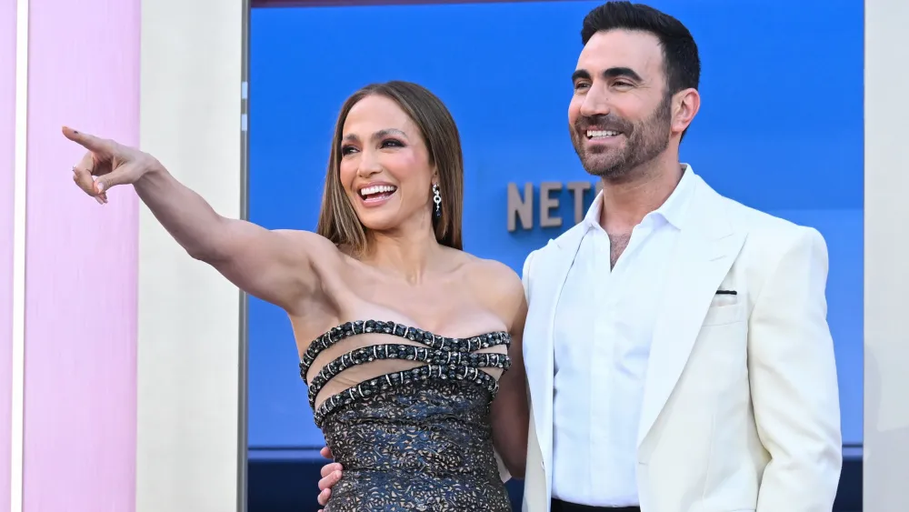 Jennifer Lopez on Meeting ‘Office Romance’ Co-Star Brett Goldstein for the First Time and That Viral ‘Off Campus’ Video: ‘The Show Is So Cute and I Love It’