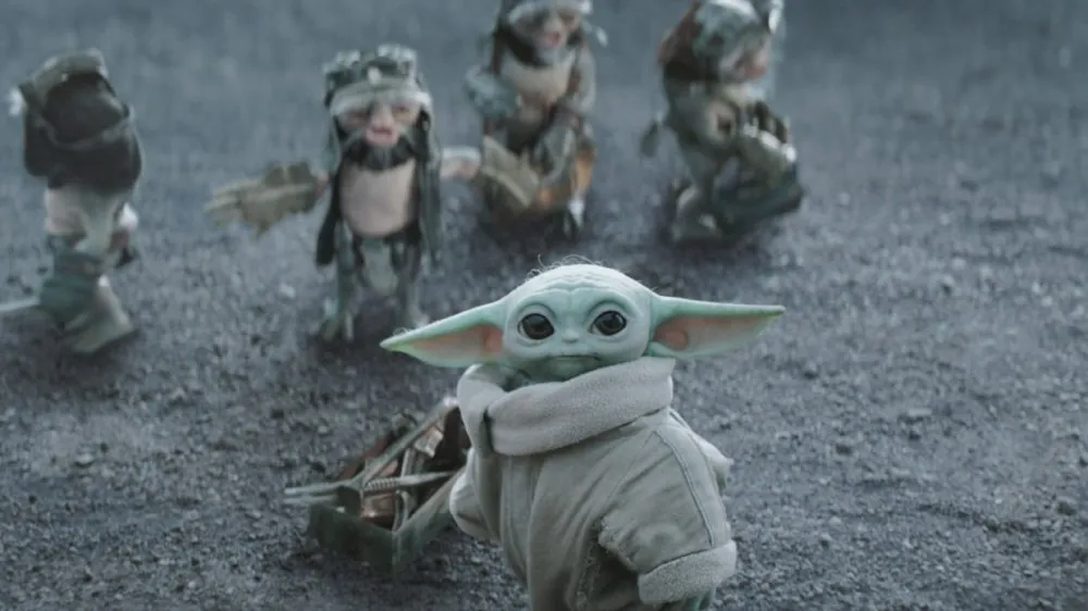 STAR WARS: THE MANDALORIAN AND GROGU, Grogu (front) with Anzellans, 2026. © Walt Disney Studios Motion Pictures / Courtesy Everett Collection