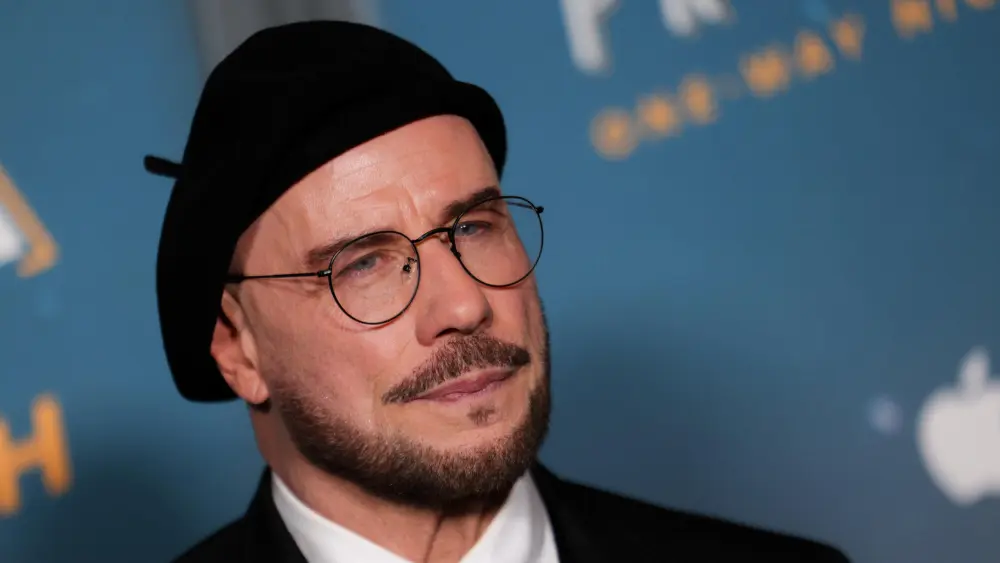 John Travolta Now Owns a Dozen Berets Because ‘Men Can Have Fun, Too. Why Not Change it Up?’