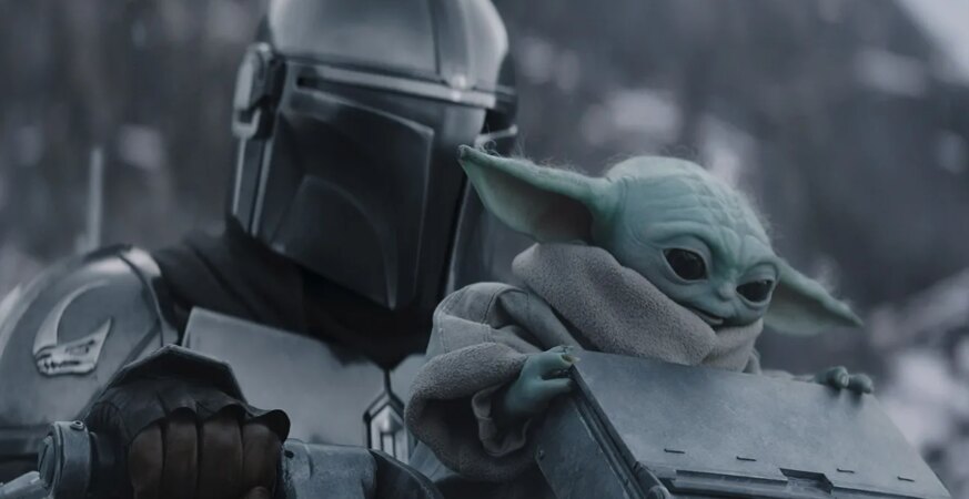 (L-R) The Mandalorian and Grogu in Lucasfilm's The Mandalorian and Grogu