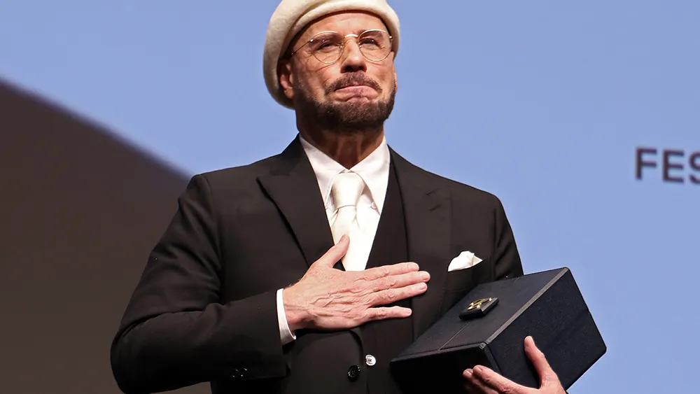 John Travolta Cries as Cannes Surprises Him With Honorary Palme d’Or: ‘This Is Beyond the Oscar’