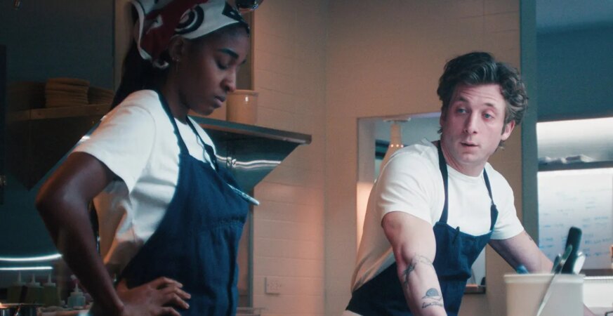 FX's The Bear Season 5, Episode 3 Pictured: (l-r) Ayo Edebiri as Sydney Adamu, Jeremy Allen White as Carmen "Carmy" Berzatto.