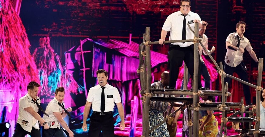 NEW YORK, NEW YORK - JUNE 07: Andrew Rannells and Josh Gad perform onstage with the cast of Book of Mormon during The 79th Annual Tony Awards at Radio City Music Hall on June 07, 2026 in New York City. (Photo by Theo Wargo/Getty Images for Tony Awards Productions)