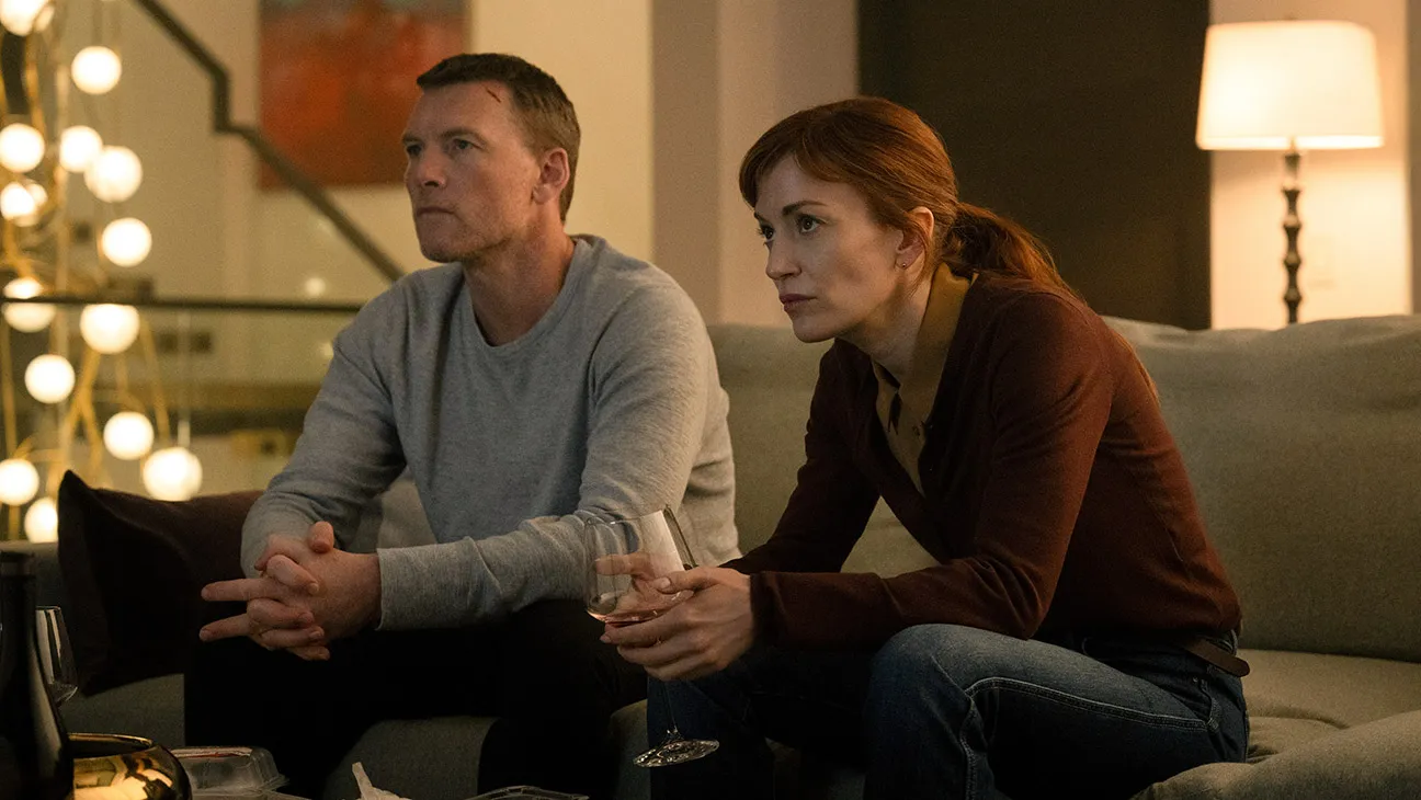 (L to R) Sam Worthington as David Burroughs and Britt Lower as Rachel Mills in Episode #102 of I Will Find You.
