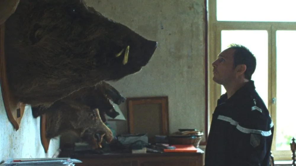 ‘Too Many Beasts’ Review: A Small-Town Policeman Gets High on the Hog in a Deliciously Droll French Crime-Caper