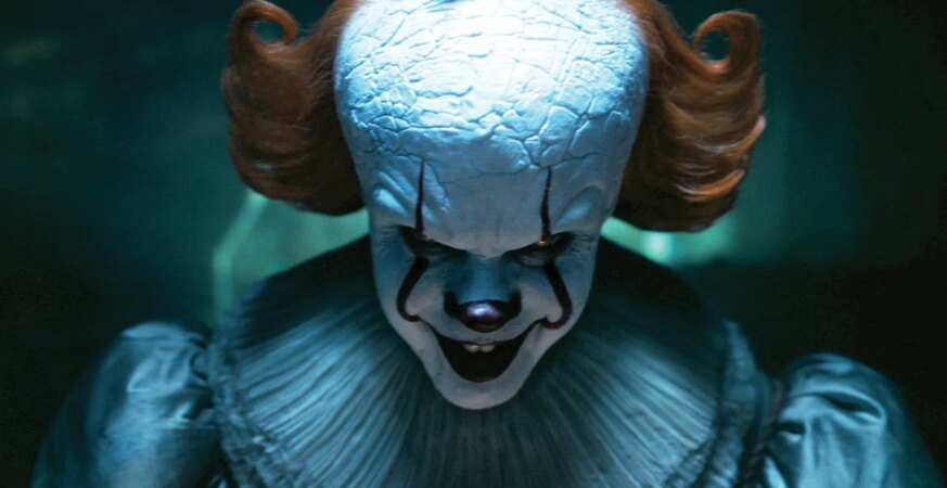 Bill Skarsgard stars as Pennywise, the titular antagonist of It: Welcome to Derry.