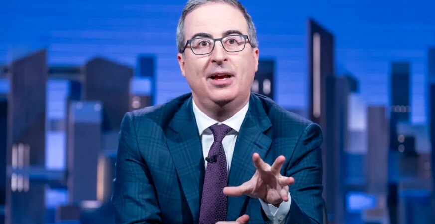 John Oliver Debuts FYC Ad for ‘Last Week Tonight’ Featuring Guns, a Wine-Drinking Horse and The Fonz Wielding a Pickax